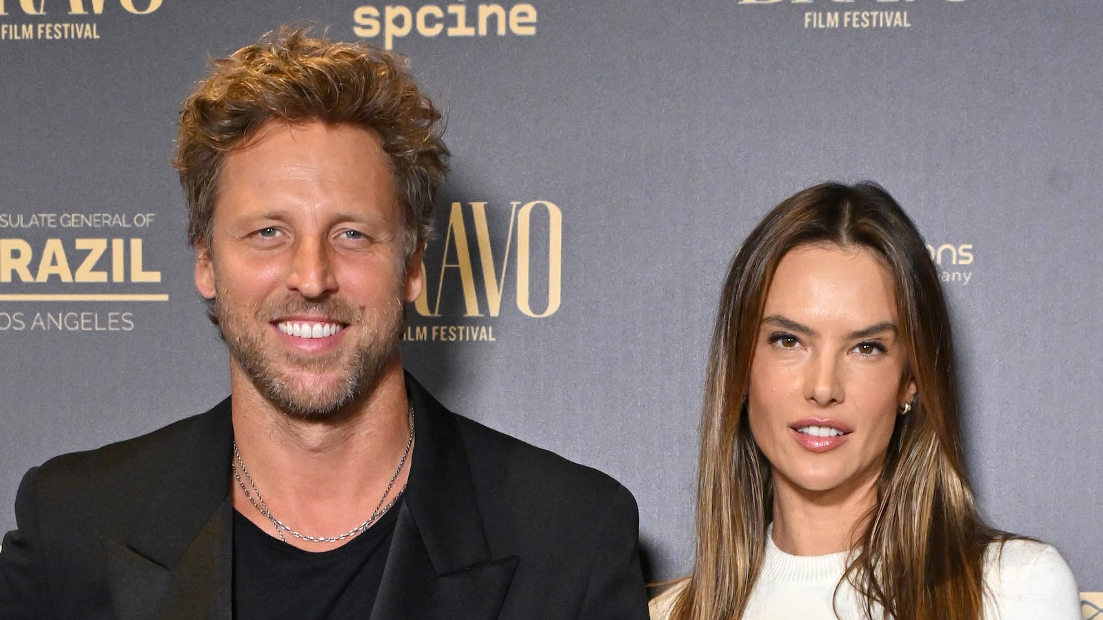 LOS ANGELES, CALIFORNIA - OCTOBER 19: Buck Palmer and Alessandra Ambrosio attend the Bravo Film Festival: Opening Night Screening of "The Secret Agent" at Academy Museum of Motion Pictures, Ted Mann Theater on October 19, 2025 in Los Angeles, California. (Photo by Axelle/Bauer-Griffin/FilmMagic)