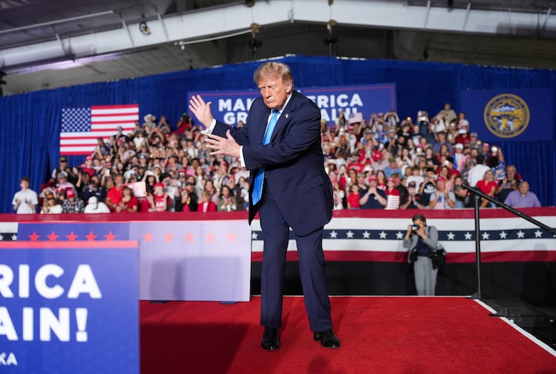 President Donald Trump dances on stage during a rally at Pinnacle Bank Expo Center in Grand Island, Nebraska, October 5, 2026.