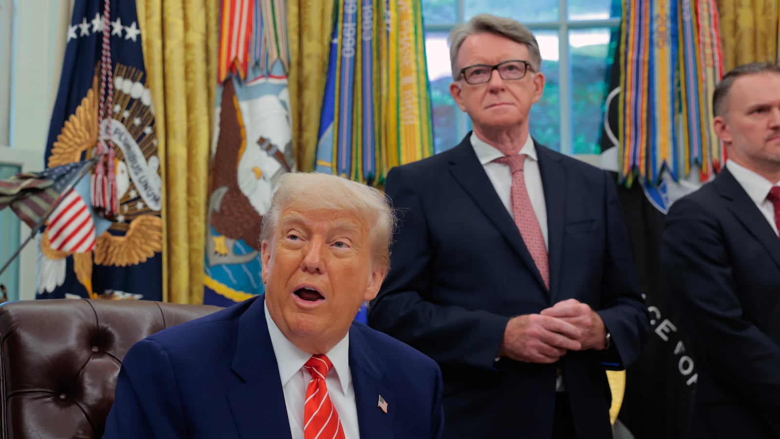 WASHINGTON, DC - MAY 08: U.S. President Donald Trump along with Vice President JD Vance and Peter Mandelson, British Ambassador to the United States, address reporters in the Oval Office at the White House on May 08, 2025 in Washington, DC. During his remarks Trump spoke about a trade deal with the United Kingdom that he announced today on Truth Social. (Photo by Anna Moneymaker/Getty Images)
