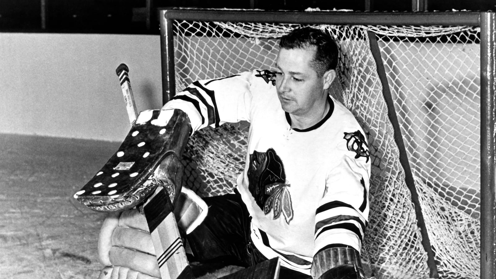 1964; Goalie Glenn Hall #1 of the Chicago Blackhawks makes a save during a portrait session circa 1964.