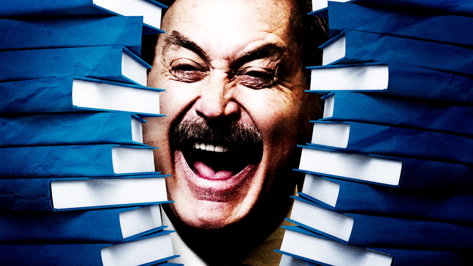 Mike Lindell peeking from behind stacks of books.