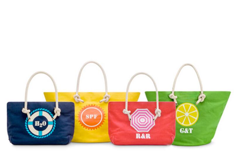 galleries/2009/06/03/the-new-beach-essentials/beach-bag---kate-spade-bag_kngsff