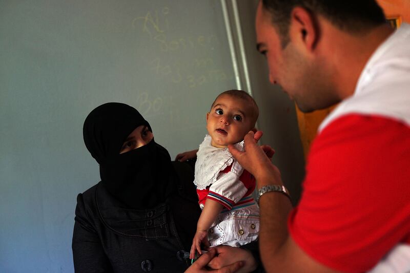 galleries/2013/08/22/syria-s-child-refugee-crisis-hits-one-million-children-displaced-photos/130822-child-refugees-baby_ifcyjo