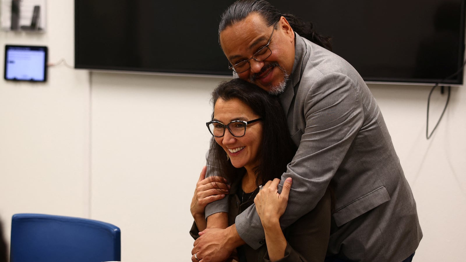 Democrat Mary Peltola reacts with her husband Gene Peltola at a temporary office space after results showed her to be the apparent winner in Alaska’s special U.S. House election.