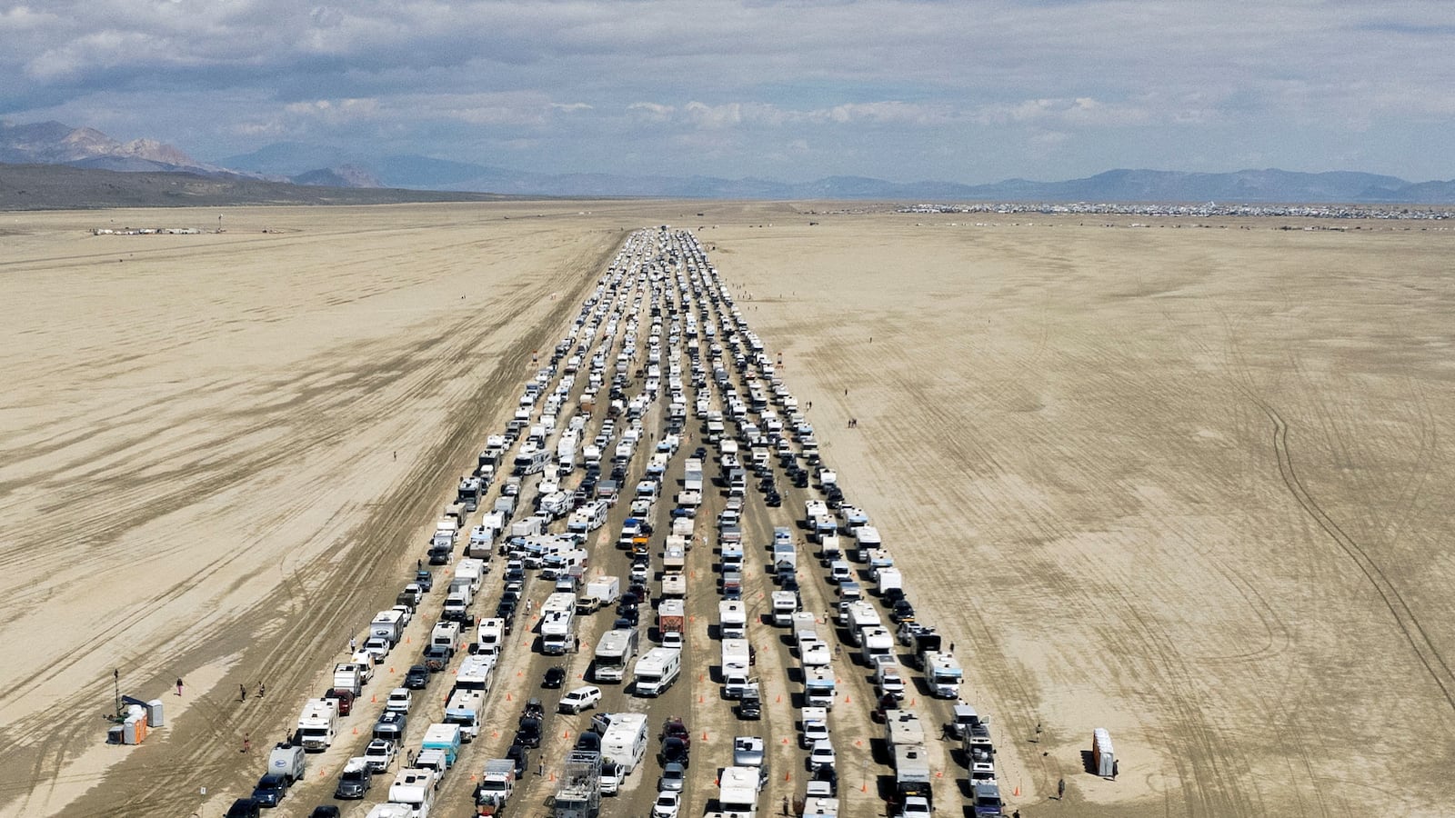 Vehicles are seen departing the Burning Man festival in Black Rock City, Nevada, U.S., September 4, 2023.