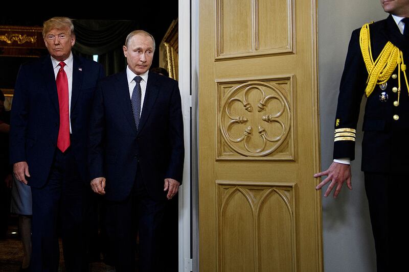 President Donald Trump and Russian President Vladimir Putin arrive for a meeting in Helsinki, on July 16, 2018.