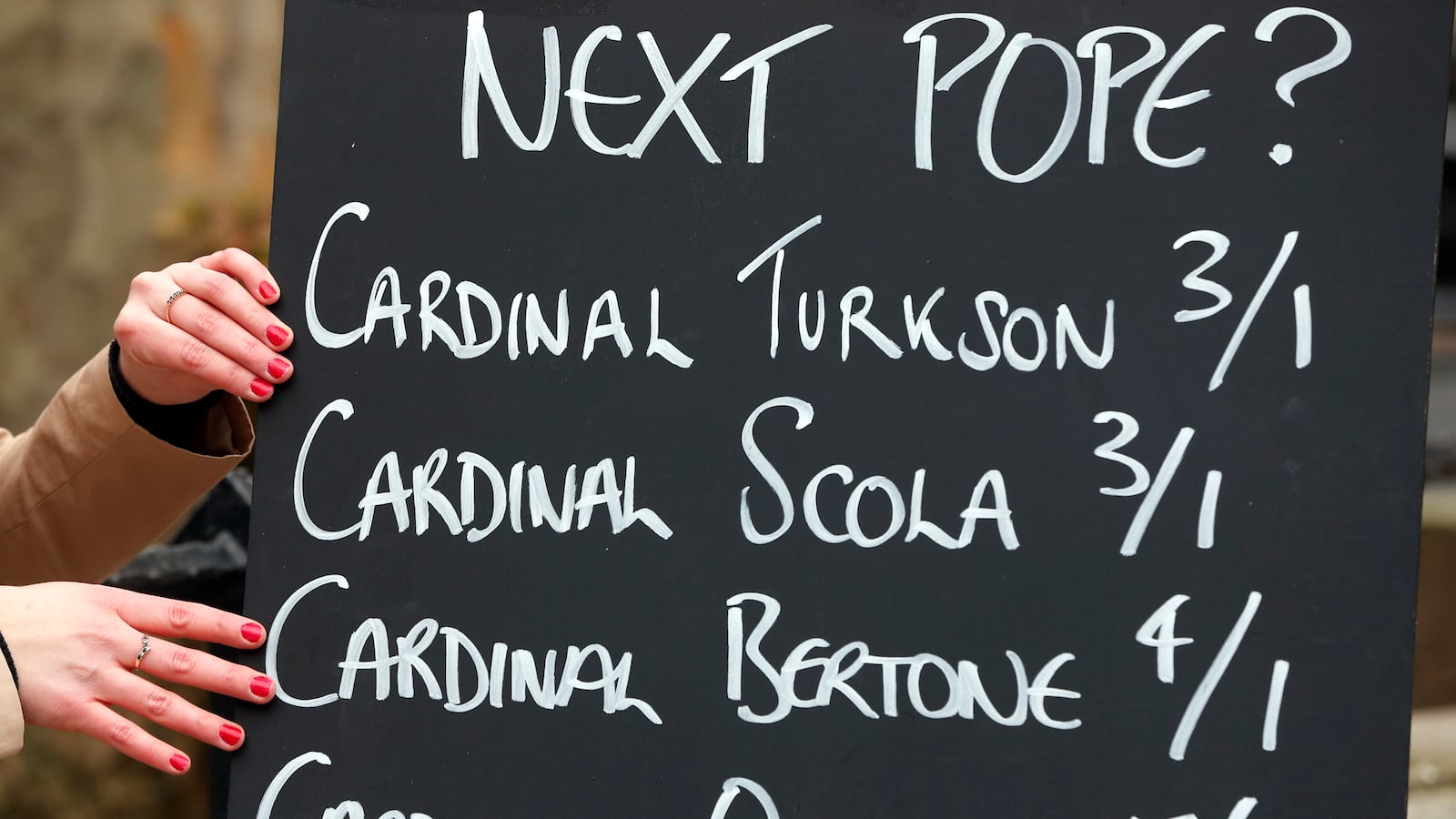 articles/2013/03/04/betting-on-next-pope-gives-favorable-odds-to-italian-ghanaian-clerics/130301-zeitline-betting-pope-tease-embed_m1bonh