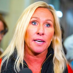 Rep. Marjorie Taylor Greene, R-Ga., talks with reporters in the Longworth Building on Tuesday, October 10, 2023.