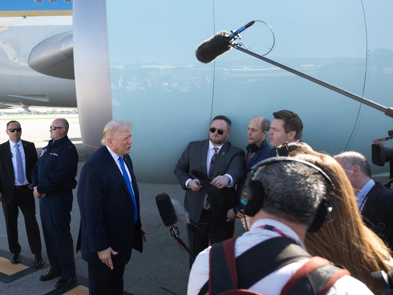 US President Donald Trump speaks to reporters before boarding Air Force One at Palm Beach International Airport in West Palm Beach, Florida, on March 23, 2026. President Donald Trump said Monday that there are "major points of agreement" in US-Iran talks which he said must result in Tehran giving up its nuclear ambitions and enriched uranium stockpile. Trump said the talks -- which Iran denies are taking place -- were being conducted with a "top person" but not the country's supreme leader. (Photo by SAUL LOEB / AFP via Getty Images)