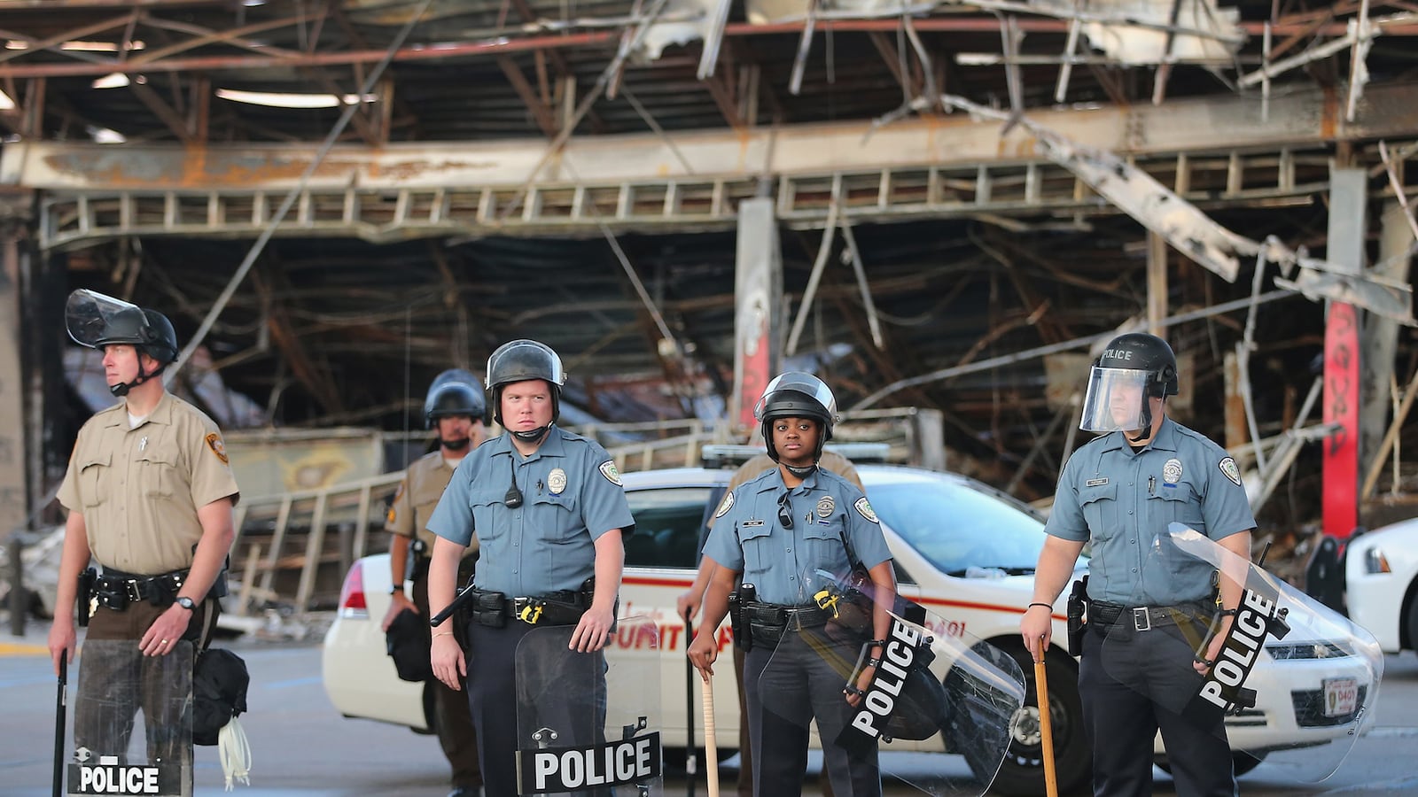 articles/2014/08/12/michael-brown-s-hometown-is-under-occupation/140812-glawe-brown-tease_b8rwty