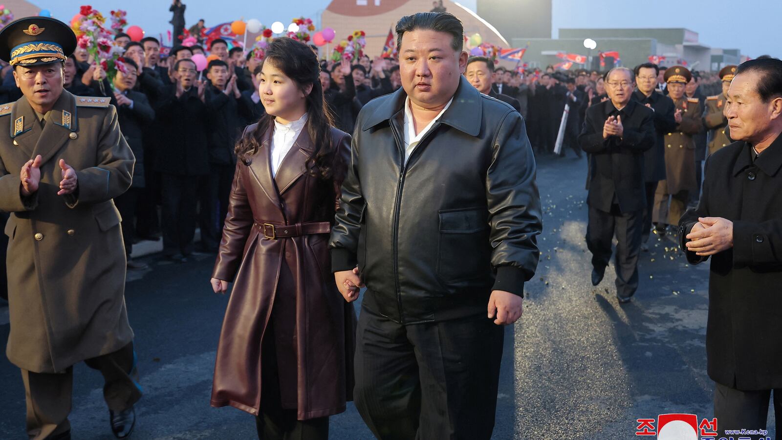 North Korean leader Kim Jong Un and his daughter Kim Ju Ae attend the opening ceremony of the Gangdong Greenhouse in North Korea.