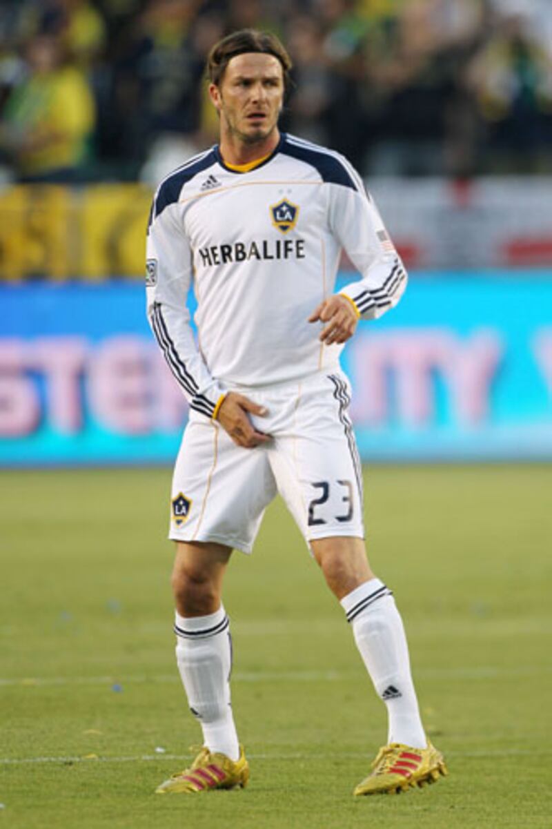 galleries/2012/04/14/zac-efron-justin-bieber-more-stars-who-adjust-in-public-photos/david-beckham-celebrity-adjustments_sx7lv2