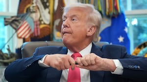 Donald Trump uncapping pen.