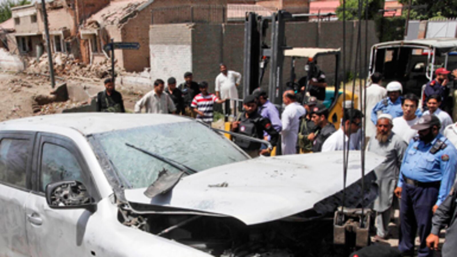 cheats/2011/05/20/taliban-strikes-us-officials-in-pakistan/us-convoy-bombing-pakistan_fuhaqe