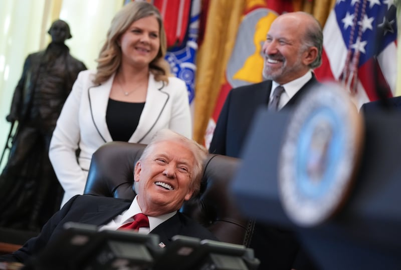 U.S. President Donald Trump, joined by Director of the White House Domestic Policy Council Heidi Overton and Commerce Secretary Howard Lutnick, delivers remarks on lowering drug prices
