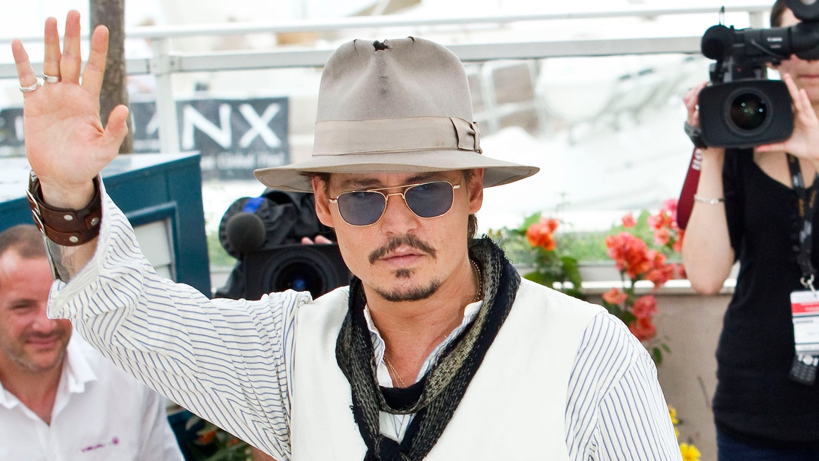 articles/2014/07/16/man-arrested-for-posing-as-johnny-depp-s-stylist-patrick-schwarzenegger-and-gigi-hadid-front-tom-ford-eyewear-campaign/140420-romano-johhny-tease_a29buh