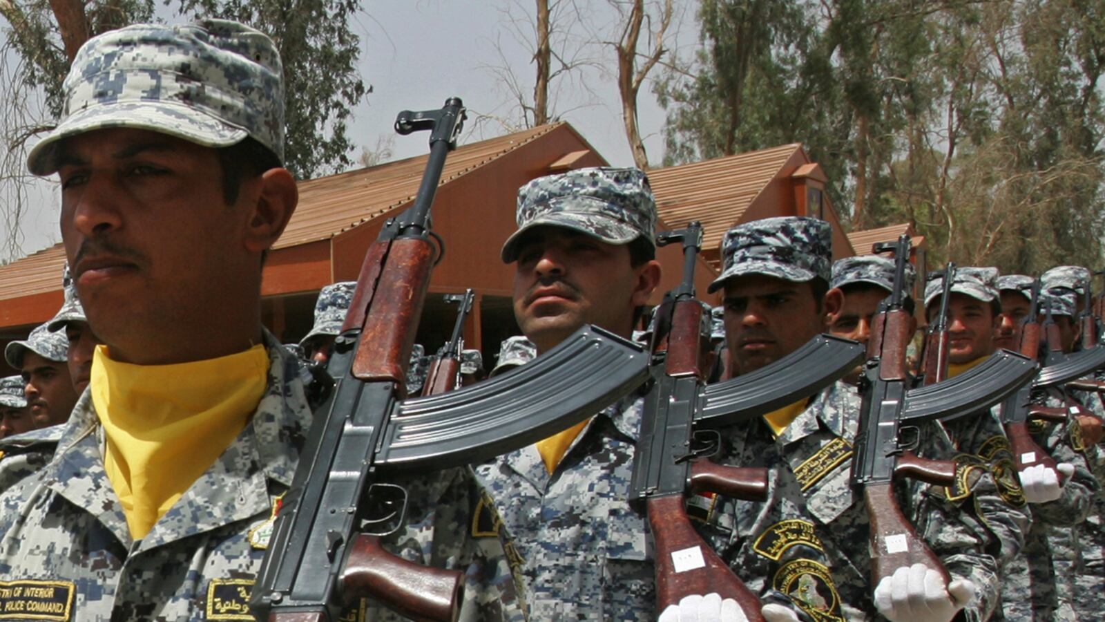 articles/2011/10/23/iraq-police-training-program-a-bottomless-pit-audit-finds/iraqi-police-roston_gvoxin