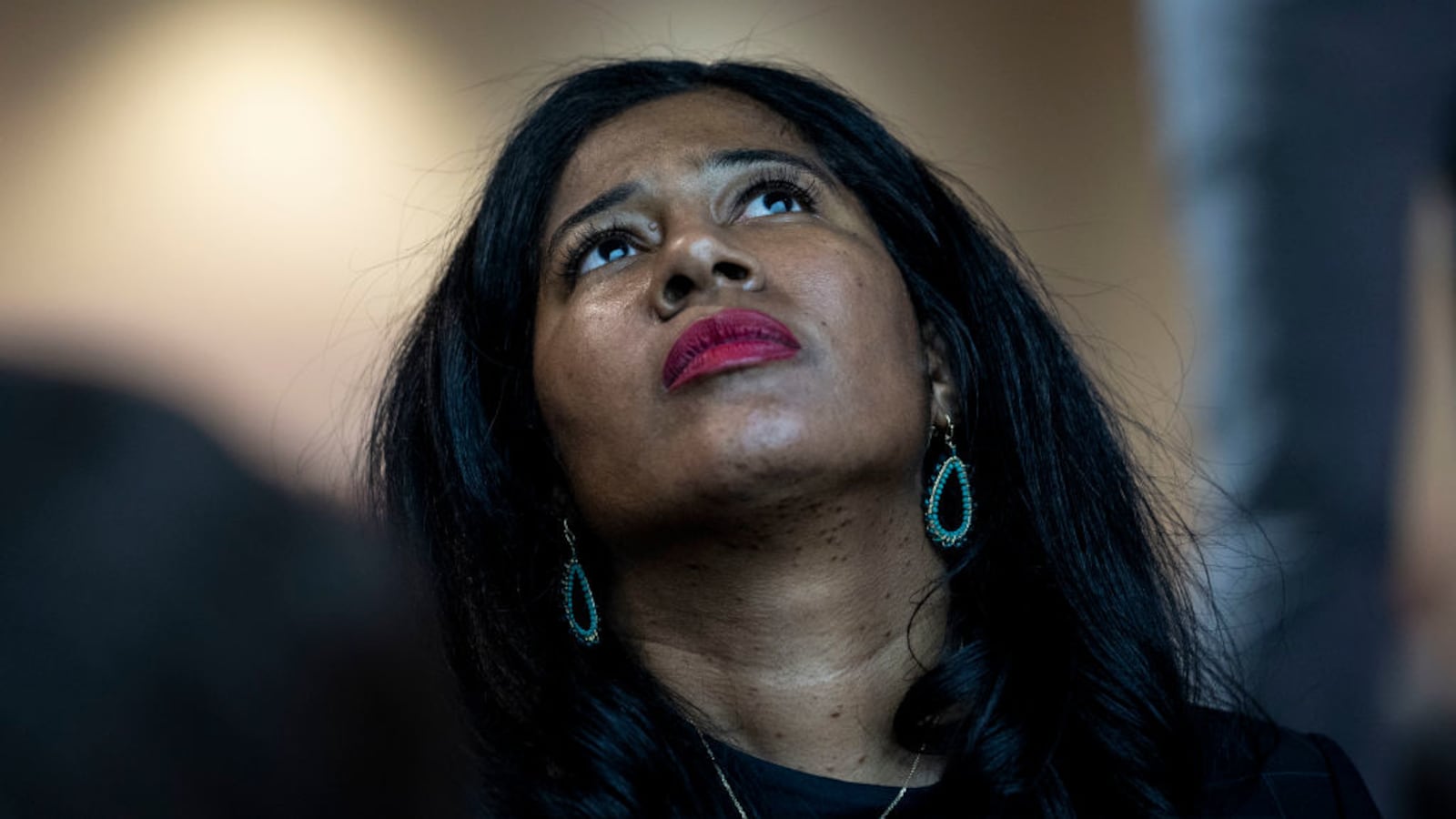 Kristina Karamo stares up.