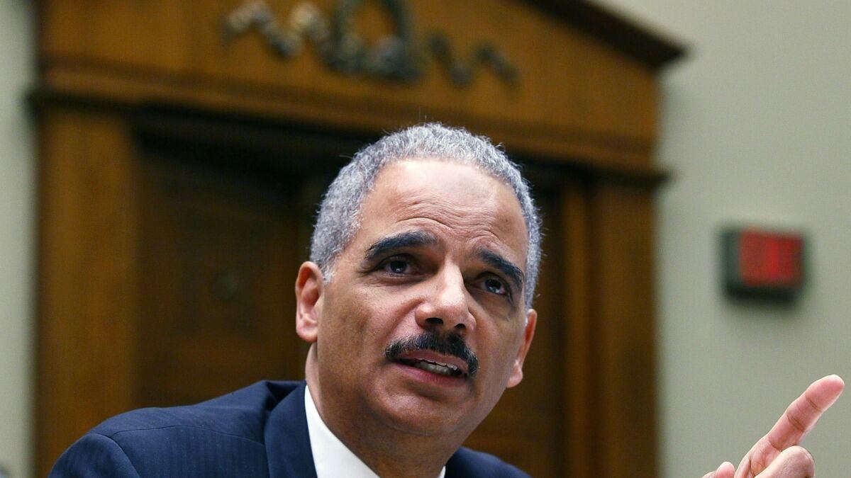 cheats/2013/07/25/doj-to-challenge-states-voting-laws/130725-eric-holder-cheat_abbenh