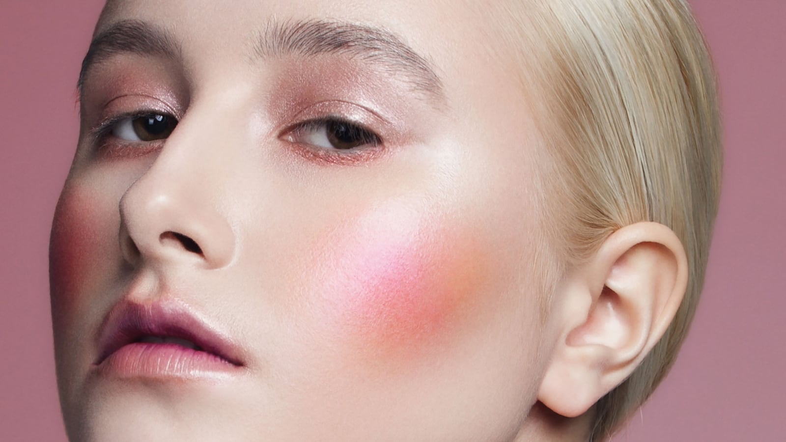 Woman with guava colored blush