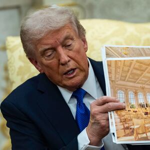 Trump shows off mock-up photos of his planned $300 million ballroom.