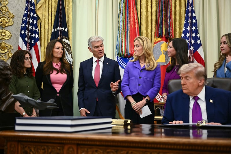 US President Donald Trump looks on as Medicare and Medicaid Administrator Mehmet Oz (3L) speaks during a Maternal Healthcare Event in the Oval Office of the White House in Washington, DC, on May 11, 2026. (Photo by Kent NISHIMURA / AFP via Getty Images)