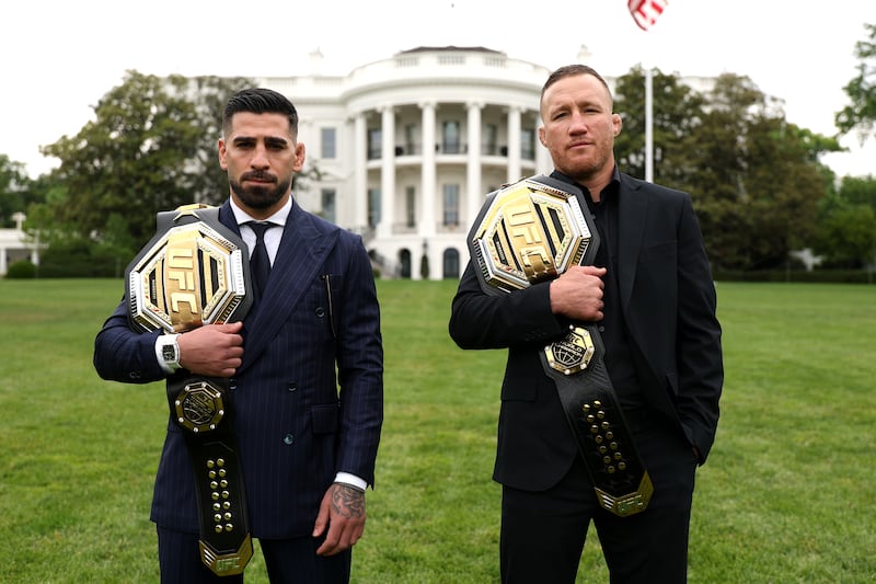 (L-R) Ilia Topuria and Justin Gaethje pose on the South Lawn in front of the White House.