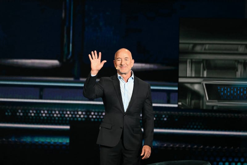 Amazon's founder Jeff Bezos arrives to speak during the American Business Forum at the Kaseya Center in Miami on November 6, 2025.