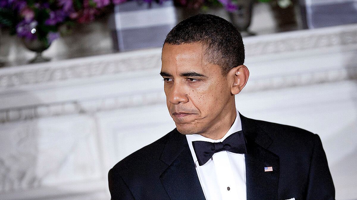 articles/2012/02/27/obama-dragged-down-by-complex-issues/obama-down-cheat_oqntyj