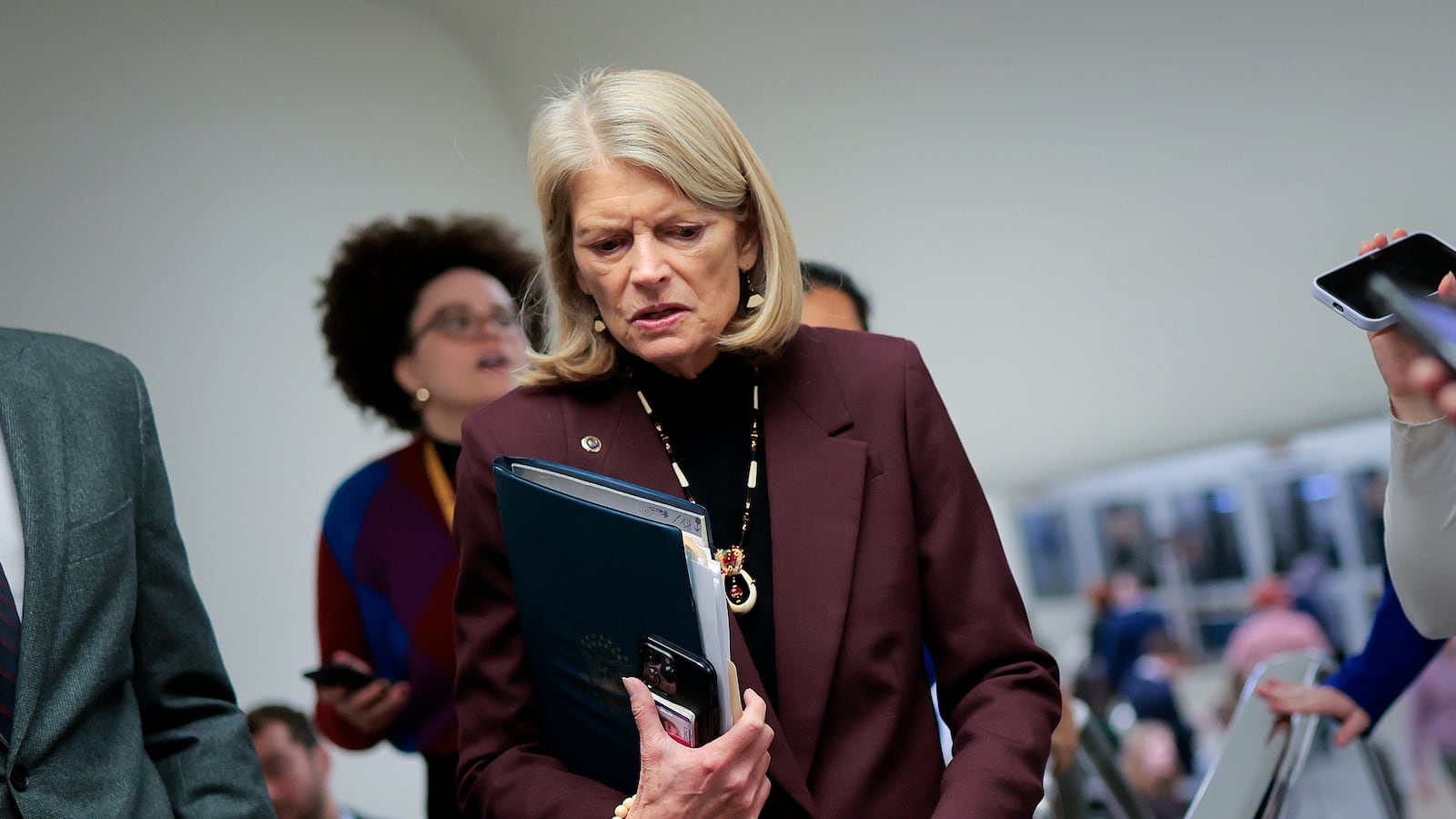 Sen. Lisa Murkowski said she "hates" the idea of the U.S. taking Greenland by force or buying it.