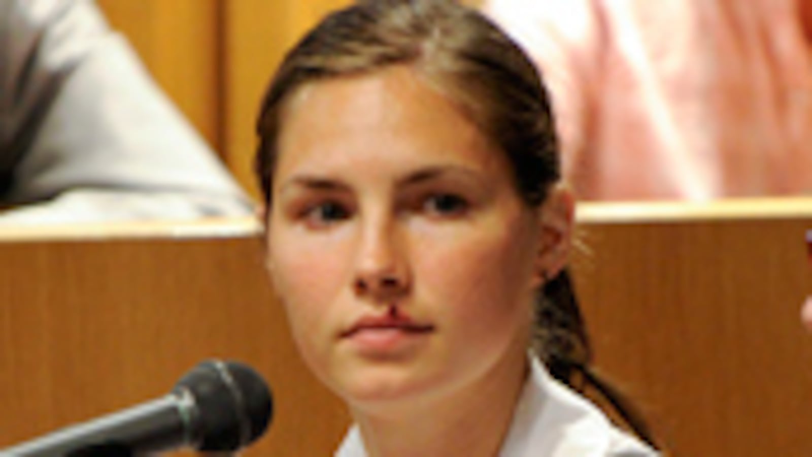 articles/2009/06/12/amanda-knox-tells-her-story/nadeau-knox--1_eioaoi