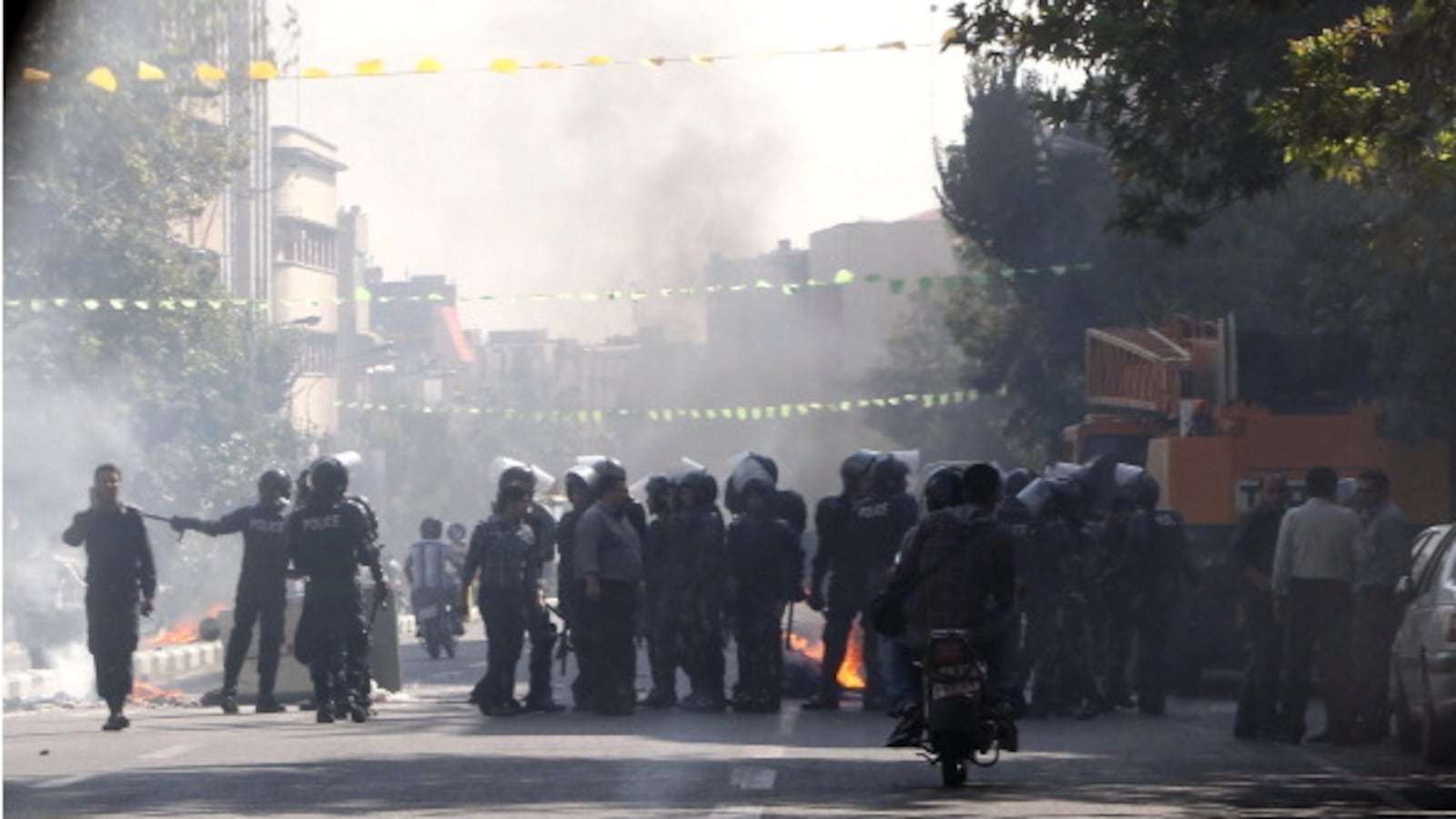 articles/2012/10/04/check-out-the-rial-situation/iran-riot-police-openz_cryck9