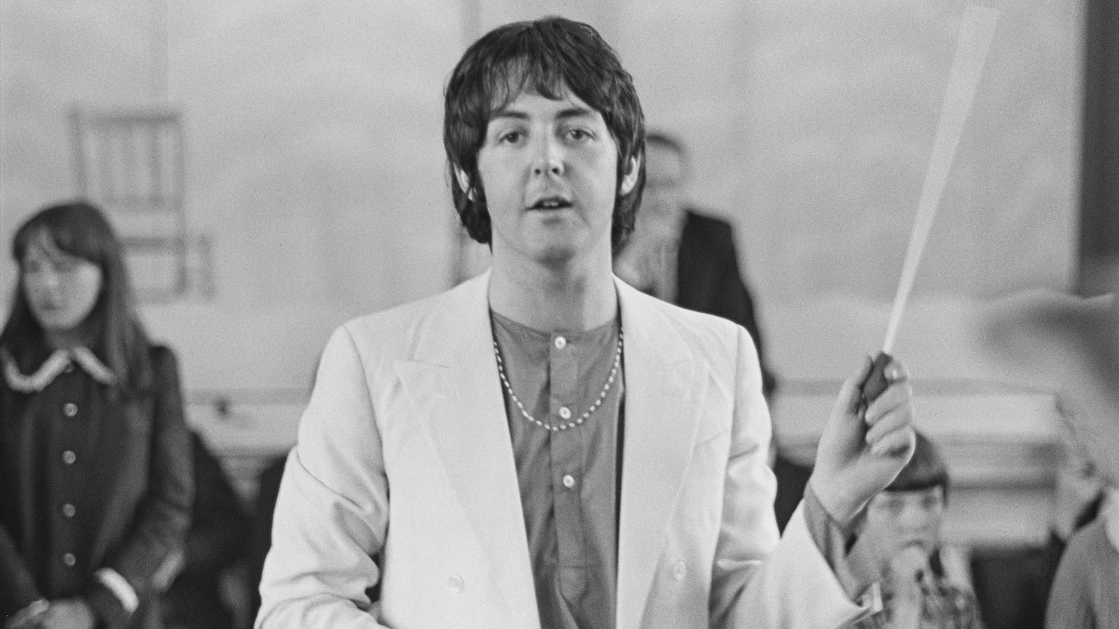 Paul McCartney records the Lennon-McCartney composition 'Thingumybob' with the Black Dyke Mills Band in Saltaire, City of Bradford, West Yorkshire, 30th June 1968.