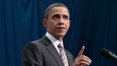 articles/2011/03/28/libya-war-gaddafi-listen-to-obama/stone-obama-gaddafi_169798_gypng8