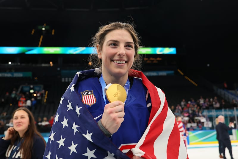 Gold medalist Hilary Knight #21 of Team United States celebrates after the medal ceremony for Women's Ice Hockey after the Women's Gold Medal match between the United States and Canada on day 13 of the Milano Cortina 2026 Winter Olympic games at Milano Santagiulia Ice Hockey Arena on February 19, 2026 in Milan, Italy.