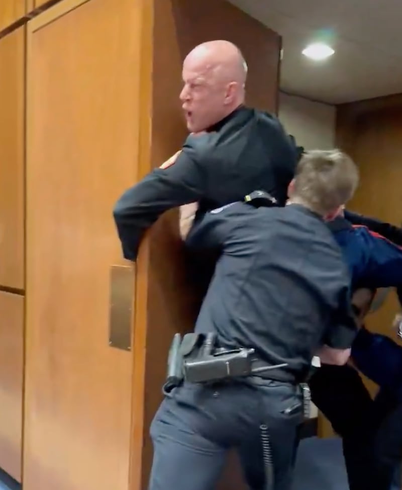 The moment McGinnis, with anguish oin his face, appeared to have his arm broken.