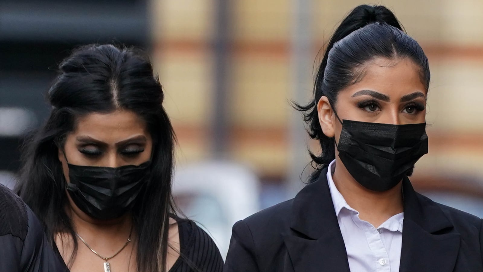A photo of Mahek Bukhari and her mother Ansreen Bukhari arriving at Leicester Crown Court.