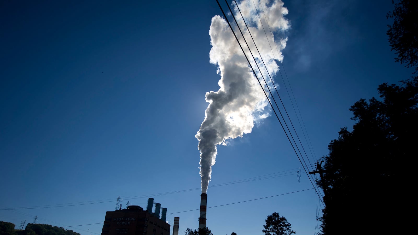 articles/2014/06/02/obama-s-new-emissions-rules-will-yank-the-climate-change-debate-back-into-reality/140602-kohn-emissions-tease_diy4sd