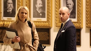 WASHINGTON, DC - MARCH 01: Executive assistant to the President Natalie Harp and U.S Homeland Security Advisor and White House Deputy Chief of Staff Stephen Miller return to the White House on March 01, 2026 in Washington, DC. On Saturday, President Trump announced that the United States and Israel had launched strikes on Iran targeting political and military leaders, as well as Iran's ballistic missile and nuclear programs. (Photo by Tasos Katopodis/Getty Images)