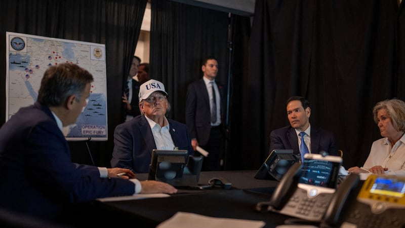 President Donald Trump speaks with CIA Director John Ratcliffe, accompanied by White House Chief of Staff Susie Wiles and Secretary of State Marco Rubio, during military operations in Iran, at Trump's Mar-a-Lago resort in Palm Beach, Florida, U.S. February 28, 2026.  The White House/Social Media/Handout via REUTERS    THIS IMAGE HAS BEEN SUPPLIED BY A THIRD PARTY. SOME AREAS BLURRED AT SOURCE.