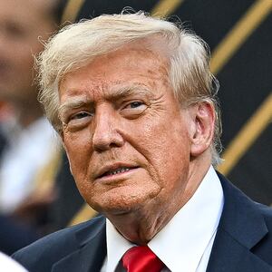 EAST RUTHERFORD, NEW JERSEY - JULY 13: Donald J. Trump enters the field after the FIFA Club World Cup 2025 final match between Chelsea FC and Paris Saint-Germain at MetLife Stadium on July 13, 2025 in East Rutherford, New Jersey. (Photo by Stephen Nadler/ISI Photos/ISI Photos via Getty Images)