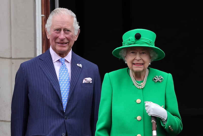 Queen Elizabeth II and Prince Charles, Prince of Wales on the balcony of Buckingham Palace during the Platinum Jubilee Pageant on June 05, 2022 in London, England. The Platinum Jubilee of Elizabeth II is being celebrated from June 2 to June 5, 2022, in the UK and Commonwealth to mark the 70th anniversary of the accession of Queen Elizabeth II on 6 February 1952.