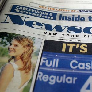 NEW YORK - MAY 12:  The newspaper Newsday is seen at a newsstand May 12, 2008 in New York City. Cablevision Systems Corporation announced it is buying the Long Island-based newspaper for $650 million from the Tribune Company.