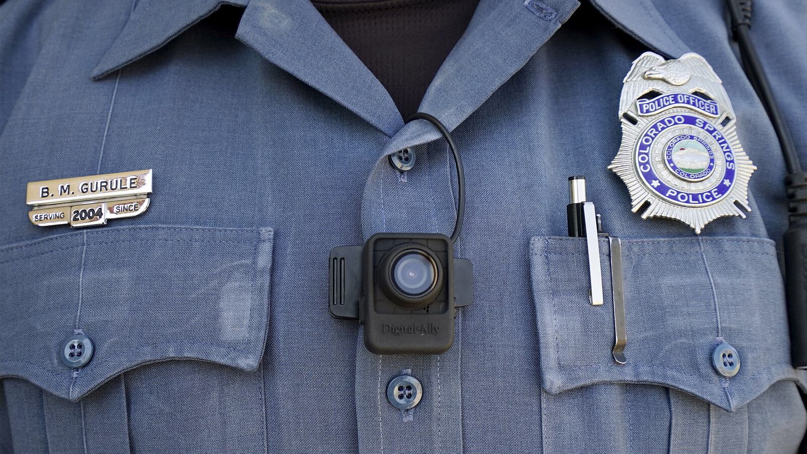 articles/2015/05/12/we-need-body-cams-before-our-cities-burn-lawmakers-say/150512-mak-cop-cam-summer-tease_xbg0rx