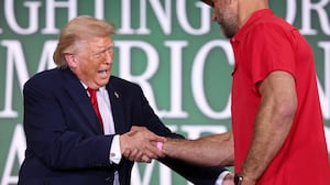 U.S. President Donald Trump shakes hands with Hall of Fame Farms owner Joe Thomas (R) as he arrives to a roundtable on agriculture at Custer Farms on June 05, 2026 in Chippewa Falls, Wisconsin.