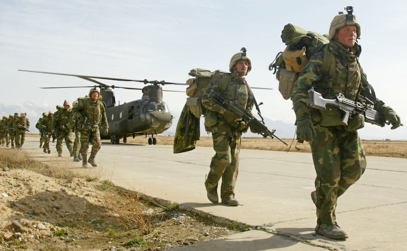 U.S. Army soldiers as they return to Bagram airbase from the fighting in eastern Afghanistan, March 11, 2002.
