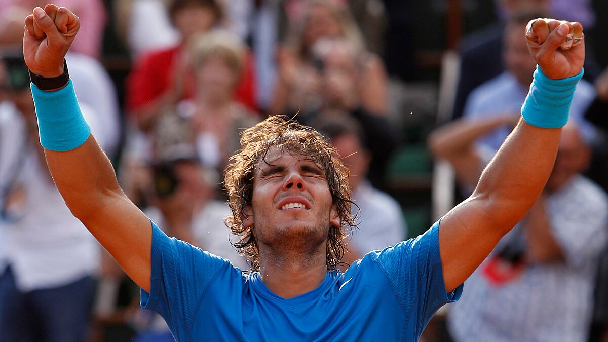 articles/2011/06/06/rafael-nadal-french-open-champ-s-emotional-punch/rafael-nadal-wins-2011-french-open-bissinger_kf9zka