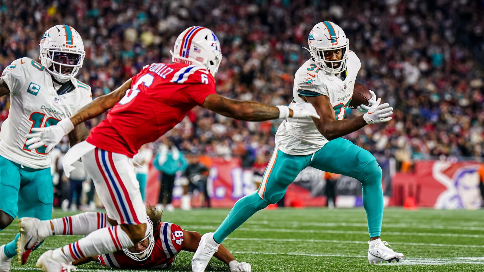 A picture of the Sunday game between the Miami Dolphins and New England Patriots. Officials are investigating the death of a man who suffered an “apparent medical event” during the fourth quarter of the game.