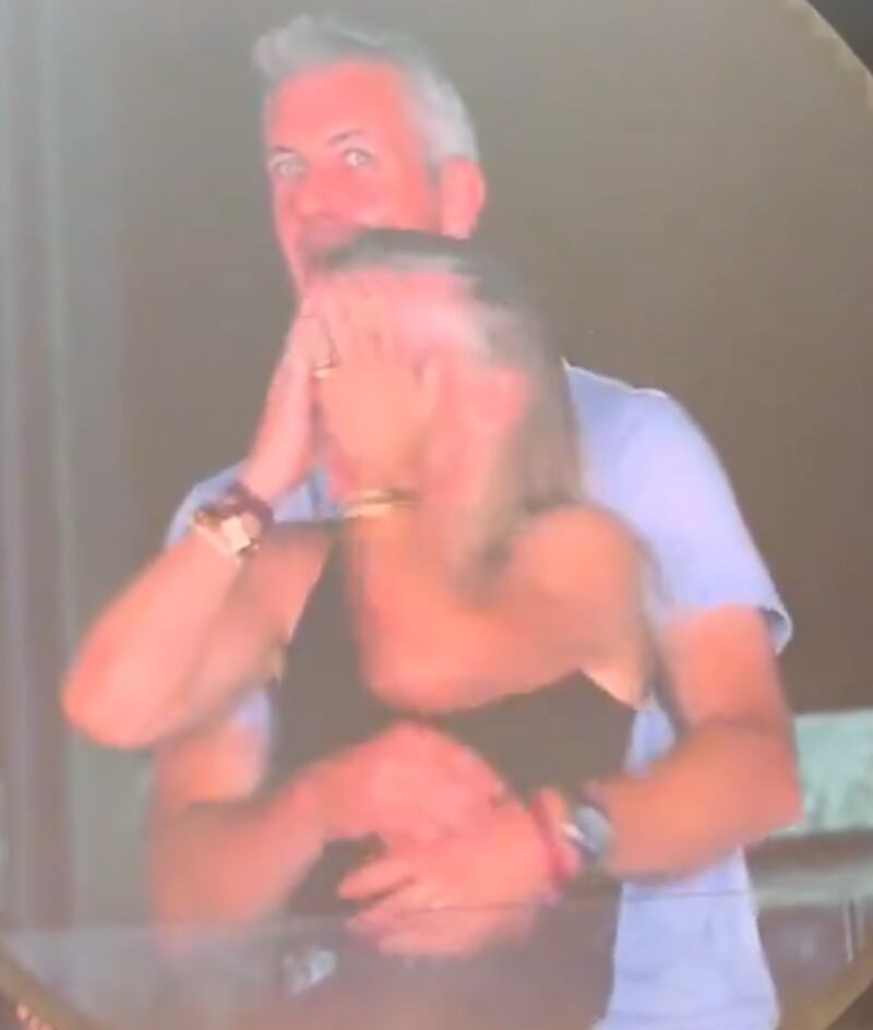 The tech executives immediately tried to conceal their faces when they appeared on the big screen.