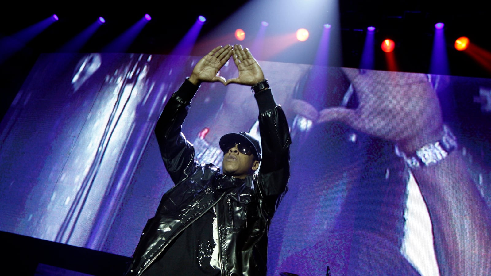 articles/2013/03/12/jay-z-just-can-t-get-away-from-illuminati-rumors/130312-Samuels-Jay_Z-tease_eqahl3